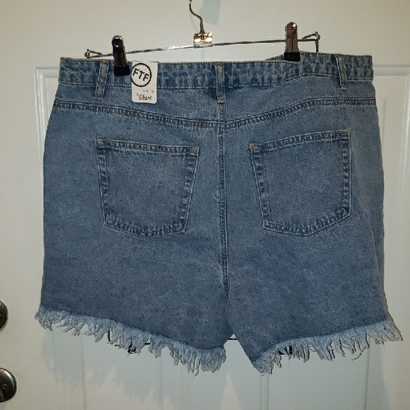 Fashion to Figure Light Blue Distressed Jean Shorts. - Picture 4 of 7